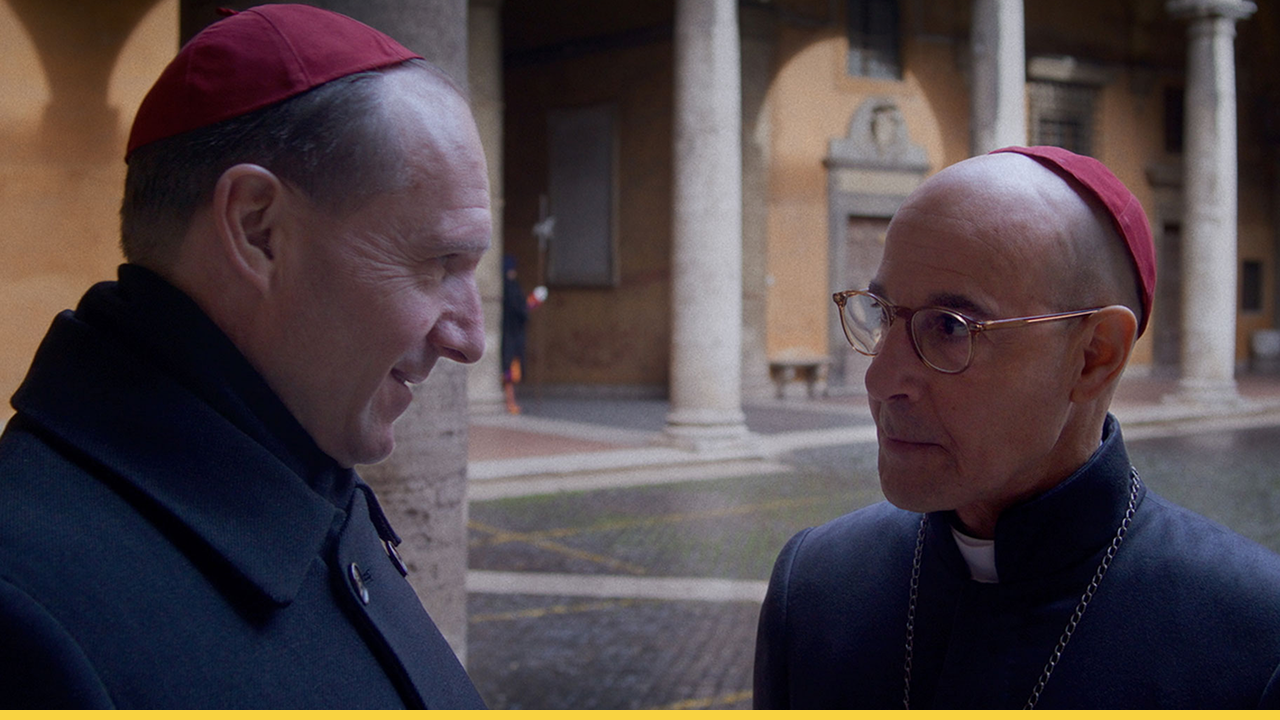 In a tense and hushed exchange, Lawrence and another cardinal discuss the implications of Tremblay's actions, including his alleged vote-buying and manipulation of other cardinals.