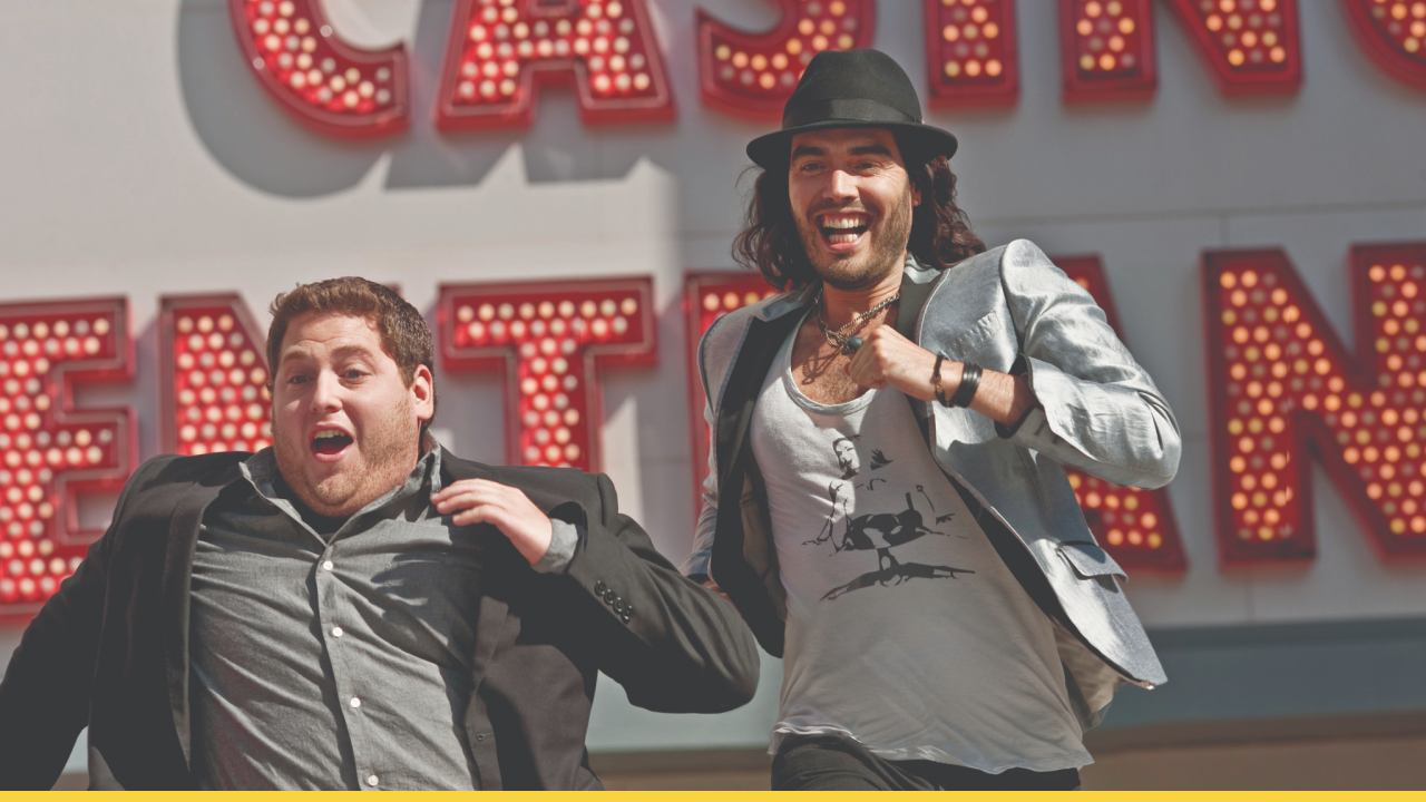 A record company intern is tasked with escorting an unpredictable rock star to a concert in Get Him to the Greek