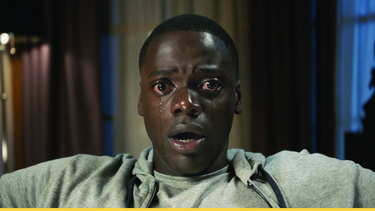A man stares in horror, paralyzed and tearful, as he descends into the terrifying "Sunken Place"
